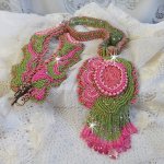 Miss Lady necklace embroidered with green and pink seed beads and a resin cabochon